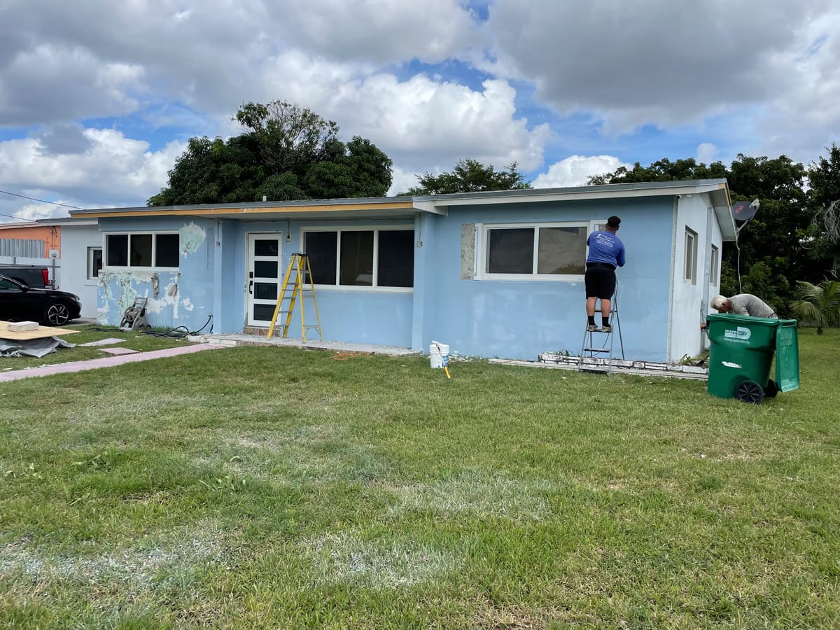 Before: Full stucco & exterior repaint